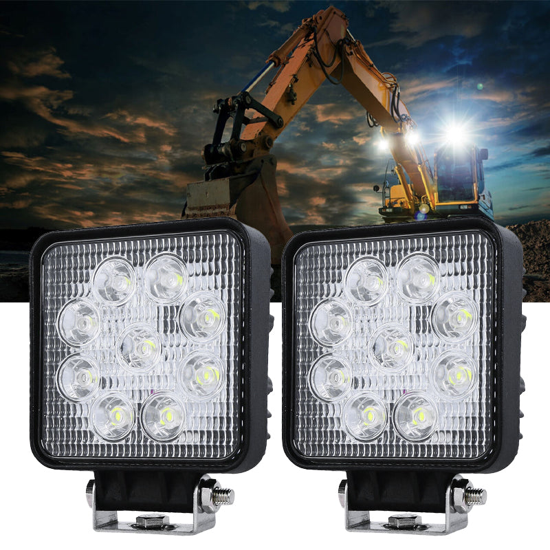 Bright LED light illuminating a construction site at night