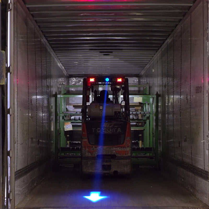 Forklift safety light mounted on overhead frame