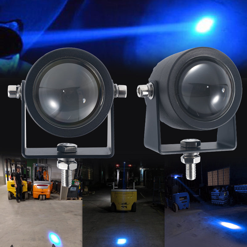 Mini blue spot light projecting warning beam on floor