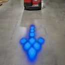 Blue arrow LED safety light behind operating forklift