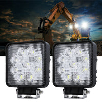 Bright LED light illuminating a construction site at night