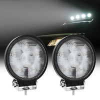 Close-up of round LED work light with high-lumen beam