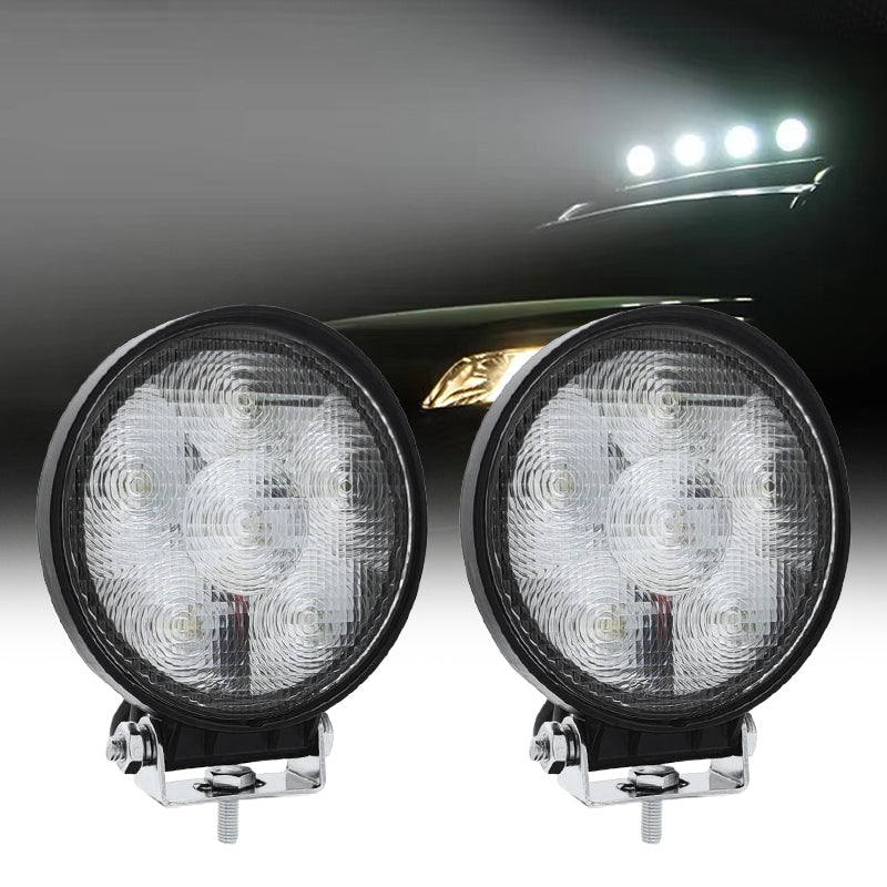 Close-up of round LED work light with high-lumen beam