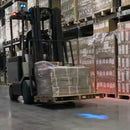 Directional arrow LED spotlight enhancing forklift safety