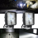 Excavator operating with LED lights in a dark worksite