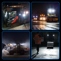 Front loader with LED work light in snowy area