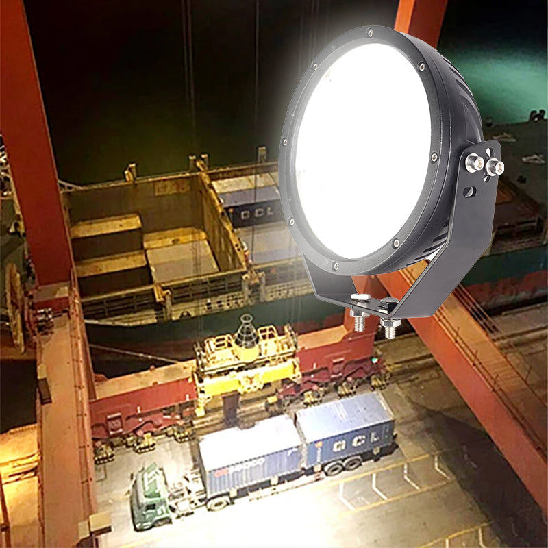 High-mast LED lighting on industrial crane at night