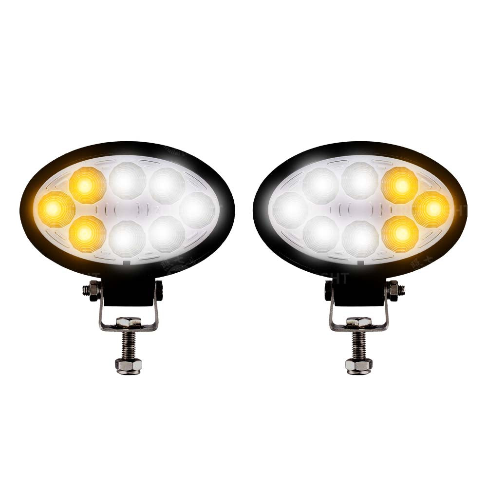 LED work light attached to heavy equipment boom