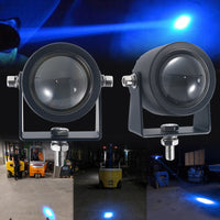 Mini blue spot light projecting warning beam on floor
