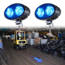 Overhead view of blue arrow warning light in warehouse