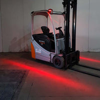 Red and blue forklift zone light for workplace safety