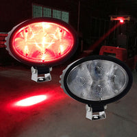 Red warning beam projected by forklift safety spotlight

