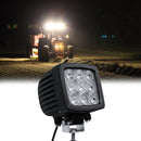 Square LED flood light mounted on construction vehicle