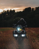 Unique eye-shaped LED light with halo for rugged vehicles is glowing